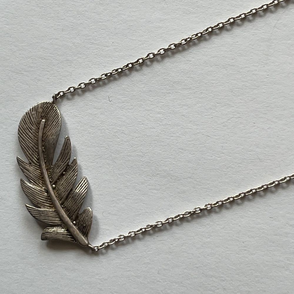 Adornia Silver Feather Necklace. MSRP $75.